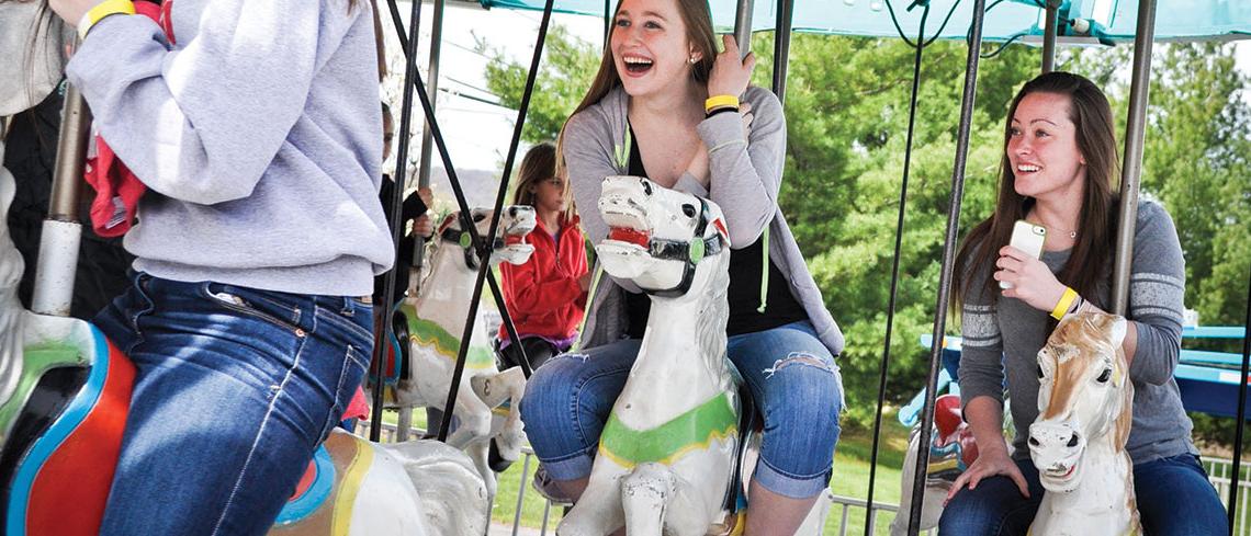 Student on carousel